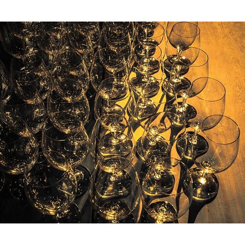 Washington State-Walla Walla Pattern of empty wine glasses in rich sunlight on wooden table